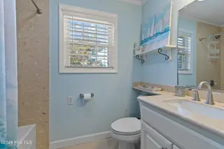 316 E Dolphin Drive, Oak Island, NC 28465 – photo 18: 316EDolphinDr - 27