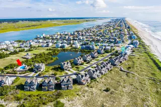 2105 Ocean Boulevard B, Topsail Beach, NC 28445 — 2-bedroom condo in Serenity Point, Topsail Beach, NC, photo 11 of 36: Aerial showing community Pool