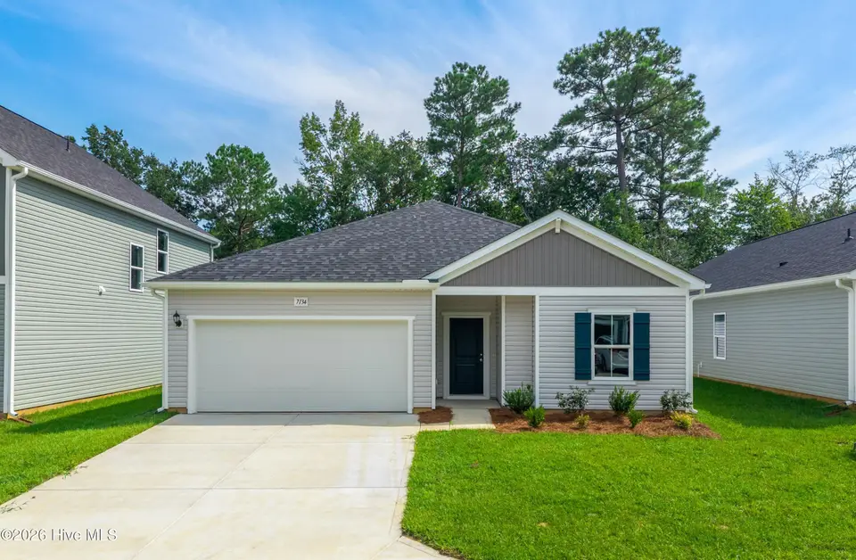 7134 Woodline Drive SW, Sunset Beach, NC 28468 – photo 1 of 37