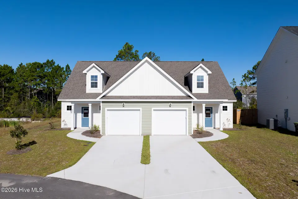 224 Sandpiper Place, Holly Ridge, NC 28445 — 3-bedroom townhome in Coastal Village, Holly Ridge, NC, photo 1 of 28: 226-224 Sandpiper - Photos - MLS_1