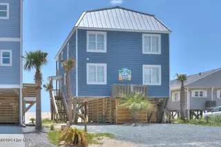 209 W Beach Drive, Oak Island, NC 28465 – photo 1: 209 W Beach Drive