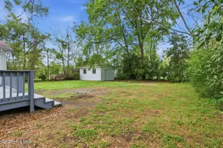 103 Puller Drive, Jacksonville, NC 28540 – photo 23: Backyard with Shed