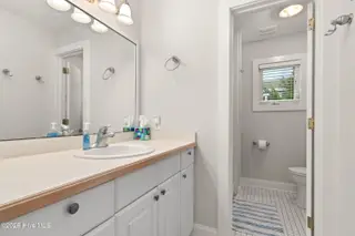 8 Royal Tern Court, Bald Head Island, NC 28461 – photo 17: Upstairs Hall Bathroom
