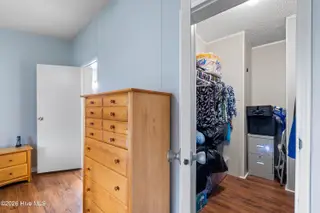 1109 Nautical Lane SW, Calabash, NC 28467 — 4-bedroom manufactured home in Village At Calabash, Calabash, NC, photo 18 of 34: Master Closet