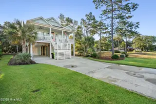 148 NW 4th Street, Oak Island, NC 28465 – photo 4: 148 NW 4th St