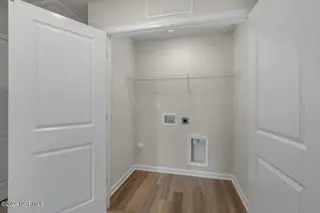 5796 Harebell Road Unit 209, Leland, NC 28451 – photo 19: Laundry Closet