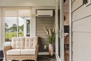 620 Eastwood Park Road 20-C, Sunset Beach, NC 28468 — 4-bedroom townhome in Sea Trail Plantation, Sunset Beach, NC, photo 20 of 63: Main Level Porch