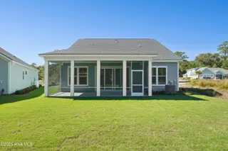 1560 St. Lucia Drive SW, Shallotte, NC 28470 – photo 2: Rear of Home