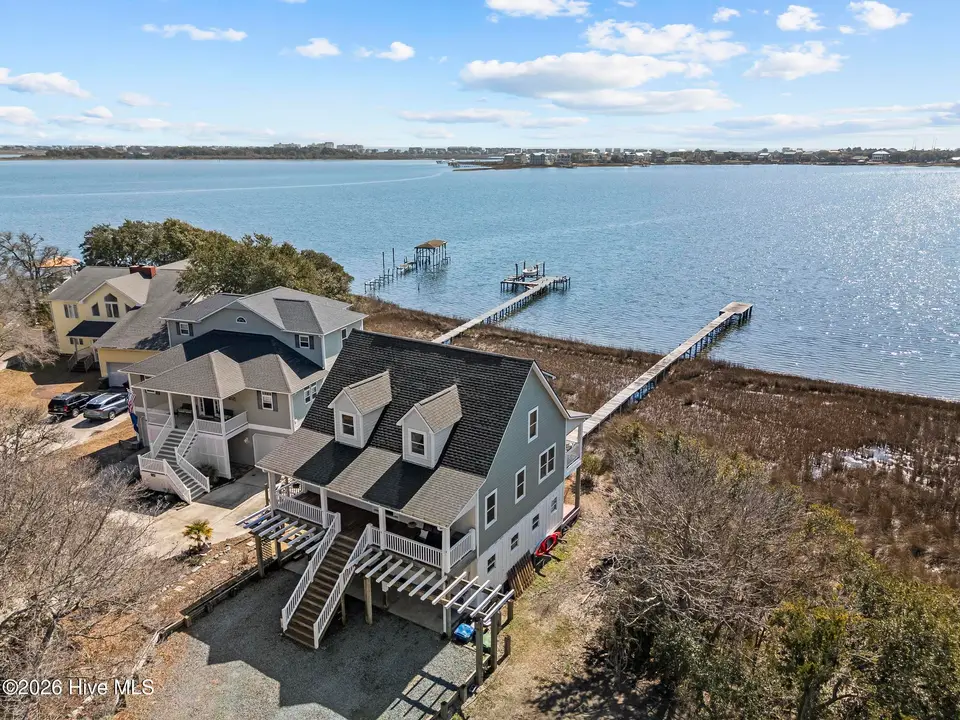 1039 Chadwick Shores Drive, Sneads Ferry, NC 28460 – photo 1 of 59: DJI_20260301115814_0121_D