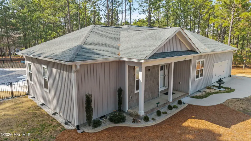 102 Roxburgh Court, West End, NC 27376 – photo 1 of 58: 53-web-or-mls-DJI_20260303143805_0001_D