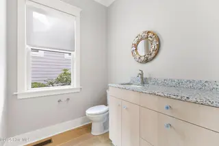 1228 Croaker Lane, Carolina Beach, NC 28428 – photo 20: Primary level half bath