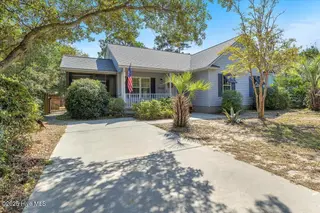 224 NE 51st Street, Oak Island, NC 28465 – photo 1: 01-Final 224 NE 51st St OKI-RJREM-8735