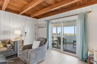 707 W Beach Drive, Oak Island, NC 28465 – photo 13: 04-Living to Entry