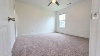 2007 Snapper Street, New Bern, NC 28562 — 4-bedroom home in Bluewater Rise, New Bern, NC, photo 23 of 31: 21 Back Second Bedroom