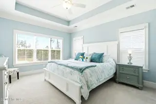 6479 Bryson Drive SW, Ocean Isle Beach, NC 28469 – photo 19: Main level primary suite