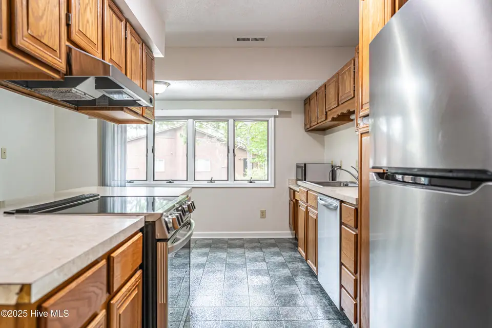 504 Fairway Court, Southern Pines, NC 28387 – photo 1 of 33: Kitchen with Updated Appliances