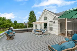 412 Waverly Court, Newport, NC 28570 – photo 2: Spacious deck with swim spa
