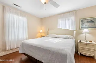 166 NW 7th Street, Oak Island, NC 28465 – photo 17: Master bedroom