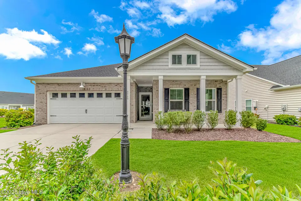 8960 Smithfield Drive NW, Calabash, NC 28467 – photo 1 of 63: Front exterior