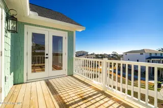 919 Calamanda Court, Morehead City, NC 28557 – photo 9: Deck off of primary suite