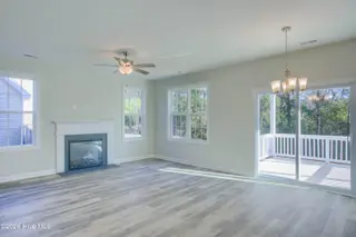 711 Jasmine Lane, Jacksonville, NC 28546 – photo 6: Living Room with view of back porch