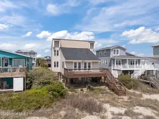 3909 W Beach Drive, Oak Island, NC 28465 – photo 10: 11-web-or-mls-DJI_20260408140404_0418_D