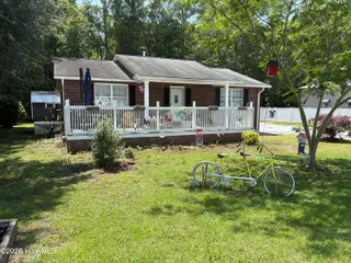 144 Waccamaw Shores Road, Lake Waccamaw, NC 28450 – photo 10: Front of Home