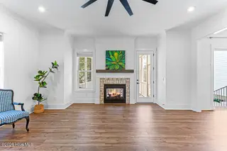 275 Hollycrest Drive, Pinehurst, NC 28374 — 5-bedroom home in Hollycrest, Pinehurst, NC, photo 16 of 42: Living Room with natural gas fireplace