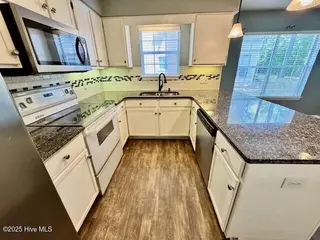 2928 Mulberry Lane A, Greenville, NC 27858 – photo 20: Step-Saver Kitchen has everything you ne