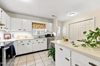 3905 Guardian Avenue H32, Morehead City, NC 28557 – photo 12: 12-web-or-mls-Colony in the Pines H32 -