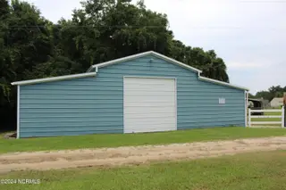 4507 Rivershore Drive, New Bern, NC 28560 – photo 9: Stable Barn with Tack area and pasture