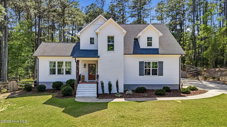 60 Cardinal Drive, Whispering Pines, NC 28327 – photo 1 of 48: 1_DJI_20260414151824_0049_D