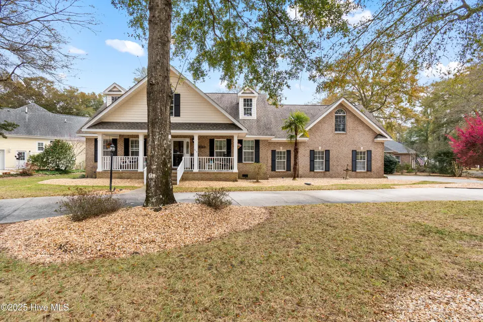 618 Oyster Bay Drive, Sunset Beach, NC 28468 – photo 1 of 62: Front Elevation