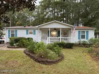 243 Ocean Forest Drive NW, Calabash, NC 28467 — 3-bedroom manufactured home in Ocean Forest, Calabash, NC, photo 2 of 61: Front of House Best