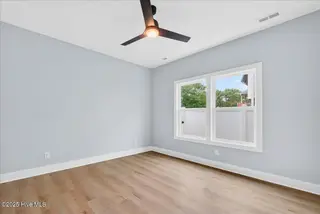 137 NE 3rd Street, Oak Island, NC 28465 – photo 22: Bedroom2