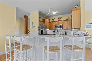 201 Shipwreck Lane, Emerald Isle, NC 28594 – photo 6: Kitchen Bar at Scilly Cat