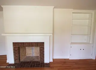 6974 River Road, Washington, NC 27889 – photo 7: FP and built-ins in Living Room