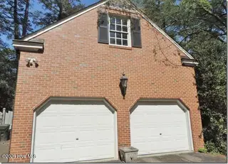 131 Ripley Road NW, Wilson, NC 27893 — 4-bedroom home in Recreation Park, Wilson, NC, photo 5 of 53: 5 Side Entry Garage