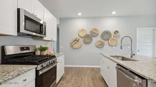 1013 Harbor Drive, Calabash, NC 28467 – photo 4: crs_1792_pic_harrisburg_kitchen3