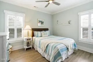 202 NE 64th Street, Oak Island, NC 28465 – photo 14: Guest bedroom 1