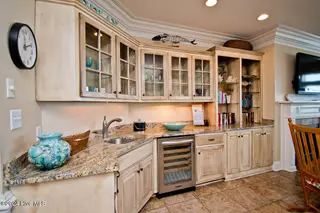 5715 Ocean Drive, Emerald Isle, NC 28594 – photo 6: LR wet bar and bookshelves