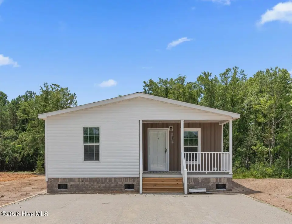 6823 Lewis Drive SE, Winnabow, NC 28479 – photo 1 of 21: 6823 Lewis Dr