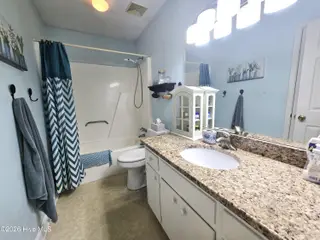 1014a Kings Way, New Bern, NC 28562 – photo 18: Bathroom with tub and shower