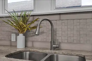 1912 Nun Street, Wilmington, NC 28403 – photo 12: Countertop, Back Splash, & Faucet