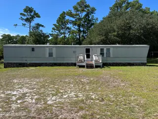 112 Pettiford Road, Peletier, NC 28584 — 3-bedroom manufactured home in Pettiford Point, Peletier, NC, photo 1 of 19: front