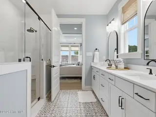 9251 Salty Breeze Place, Leland, NC 28451 — 5-bedroom home in Grand Park, Leland, NC, photo 20 of 42: Primary Bathroom - Goodwin B - Parke at