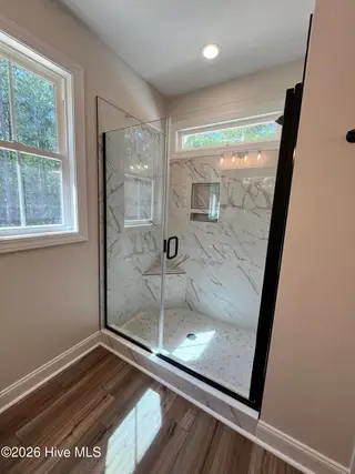 149 Wildflower Way, Pollocksville, NC 28573 – photo 14: Tiled Shower with Glass Doors