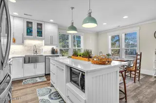 129 N Middleton Avenue, Oak Island, NC 28465 – photo 15: 09-Final 129 N Middleton Ave-RJREM-4146