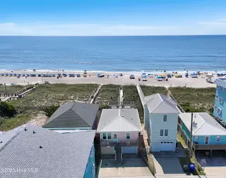 107 Carolina Beach Avenue S, Carolina Beach, NC 28428 – photo 2: Mary Cottage Aerial with Beach in Backgr