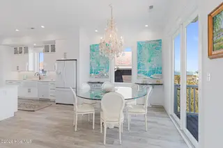 109 Coral Bay Court, Atlantic Beach, NC 28512 – photo 20: Dining Area with Deck Access